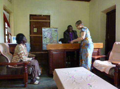 Brenda Ben with Bishop Isesomo Muhindo