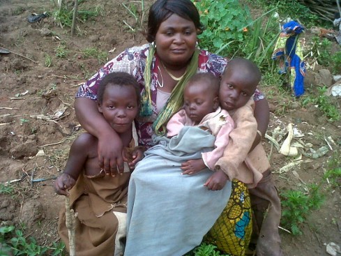 Saasita with orphans from the ADF / Nalu conflict